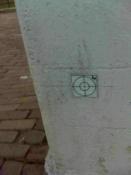 het NAP-meetpunt op de muur